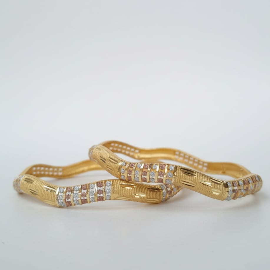 Wavy Two-Tone Gold Diamond-Cut Bangles